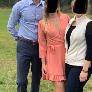 Orange wrap dress.